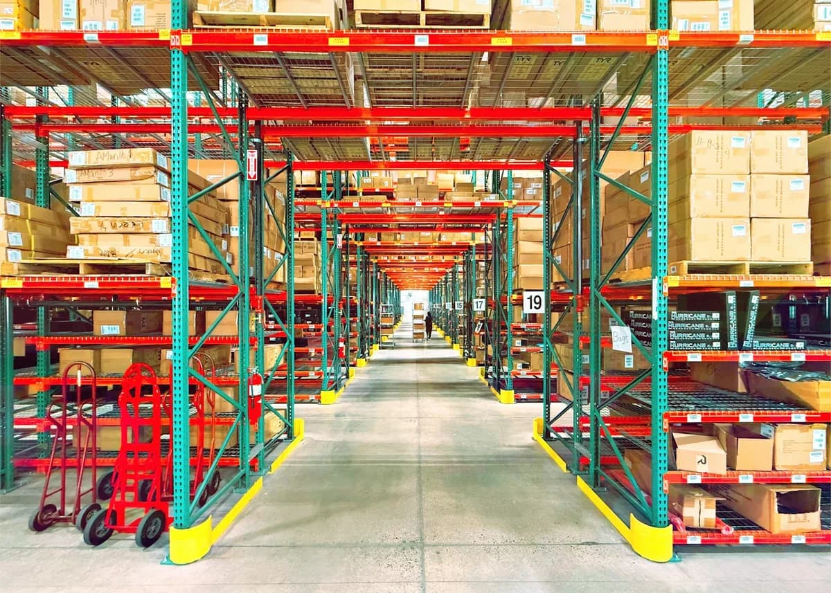 Rows of pallet racking stacked with boxes in our fulfilment warehouse